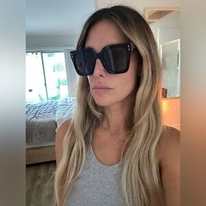 ISABEL MARANT oversized black sunglasses.